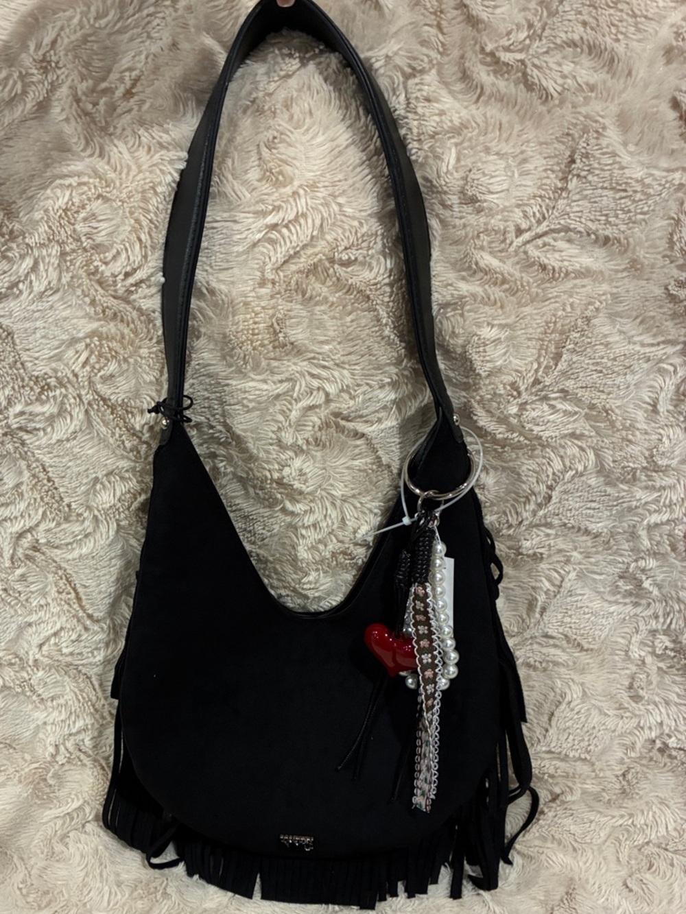 Madden NYC Black Suede Fringe Shoulder Bag with Decorative Charm Accent